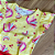 Conjunto Blusa Manga Curta Amarela Estampada e Shorts Saia Coral Menina Tamanho 3 - Imagem 2