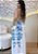 Vestido Midi Branco em Crepe com Estampa Floral Azul e Amarração nas Costas - Imagem 3