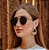 Óculos de Sol Feminino Dommus Luce Oro Preto - Imagem 4