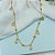 Colar Choker Penduricalhos Estrelas - Banhado a Ouro 18k - Imagem 1