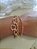 Pulseira tripla dourada - Imagem 1