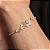 PULSEIRA DE LAÇOS CRAVEJADOS DE ZIRCÔNIAS CRISTAIS BANHO OURO 18K - Imagem 2