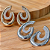 BRINCO ARGOLA FRONTAL BICOLOR - Imagem 1