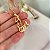 Colar Feminino Cavalo Correndo com Detalhes Vazados Banhado a Ouro 18K - Imagem 1