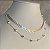 Colar Choker Duplo Seta/Coração Prata - Imagem 4
