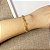 Pulseira Tripla Bolinha Dourada - Imagem 1