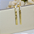 Brinco De Fita Com Zircônia Banhado Em Ouro 18k - Imagem 6