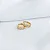 BRINCO ARGOLA COM CORAÇÕES CRAVEJADAS EM OURO 18K - Imagem 1