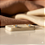 Brinco Delicate Mini Ponto de Luz Banhado a Ouro 18K e Zircônia - Imagem 1