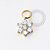 TN1634 Pingente Flor CZ Titanio PVD Gold - Imagem 1