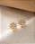 Brinco Micro Zircônia Dourado Flor - Imagem 1