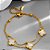 Pulseira Dupla Esfera Pingente Trevo Aço Dourado 316L⭐️ - Imagem 5
