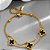 Pulseira Dupla Esfera Pingente Trevo Aço Dourado 316L⭐️ - Imagem 1