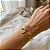 Bracelete Coração Cravejado Vazado Pedra Cristal Aço Dourado 316L⭐️ - Imagem 1
