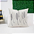 Almofada Bordada em Linho 52x52 - Oito Folhas Cinza - Imagem 1