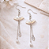 Brincos Delicados Leque Omamori Charms com Pérola - Imagem 1