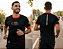 Camiseta New Balance Milha Urbana Preta e Vermelha em Poliamida - Imagem 1