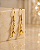 Brinco Corredora 3D de Pendurar - Folheado Ouro 18K - Imagem 1