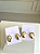 BRINCO OVAL PONTO LUZ CENTRAL - Imagem 1