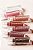 Coco - deep brown Huda Beauty Faux Filler Shiny Non-Sticky Lip Gloss - Imagem 3
