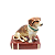 Enfeite cachorro Basset sentado no livro - Imagem 1