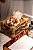 Mini Cachorro Bulldog deitado - Imagem 2
