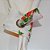 porta guardanapo de tecido fundo branco com arranjos de Natal - Imagem 2