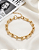 Pulseira Elo Cadeado com Esferas Banhada a Ouro - Imagem 2