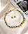 Conjunto Feminino Colar Regulável Coração Cravejado e Brinco Dourado Linha Premium Aço Inoxidável - Imagem 2