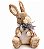 Coelho de Palha Sentado com Laço e FLores Lilas no Pescoço20x12x15cm - Coleção Canelinha - Ref 1013931 Cromus - Imagem 1