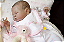 Boneca Bebê Reborn Menina Spencer 49 Cm Olhos Fechados Bebê Gordinha Linda Encantadora Com Enxoval - Imagem 1