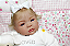 Boneca Bebê Reborn Menina Shyann 43 Cm Olhos Abertos Bebê Loirinha Muito Fofa E Realista - Imagem 4