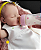 Bebê Reborn Menina Silicone Sólido 47 Cm Olhos Fechados Pode Dar Banho Acompanha Com Acessórios - Imagem 1