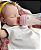 Bebê Reborn Menina Silicone Sólido 47 Cm Olhos Fechados Pode Dar Banho Acompanha Com Acessórios - Imagem 1