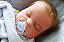 Bebê Reborn Menino Silicone Sólido 47 Cm Olhos Fechados Lindo Bebê Gordinho Realista Pode Dar Banho - Imagem 1