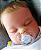 Bebê Reborn Menino Silicone Sólido 47 Cm Olhos Fechados Lindo Bebê Gordinho Realista Pode Dar Banho - Imagem 4