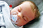 Bebê Reborn Menino Silicone Sólido 47 Cm Olhos Fechados Lindo Bebê Gordinho Realista Pode Dar Banho - Imagem 1