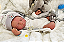 Bebê Reborn Menino Silicone Sólido 43 Cm Olhos Fechados Detalhes Reais De Um Bebê Pode Tomar Banho - Imagem 3