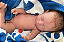 Bebê Reborn Menino Silicone Sólido 43 Cm Olhos Fechados Pode Tomar Banho Acomanha Enxoval E Chupeta - Imagem 2