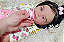 Bebê Reborn Menina Lisa 57 Cm Olhos Abertos Silicone Sólido Realista Pode Dar Banho Mama E Faz Xixi - Imagem 4