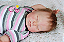 Bebê Reborn Menina Gemma 49 Cm Olhos Fechados Bebê Quase Real Acompanha Lindo Enxoval - Imagem 4