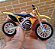 Miniatura Suzuki RM-Z 450 2010 Bburago 1:18 - Imagem 3