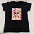 Camiseta Feminina T-Shirt Luxo Preta com Acessórios Estampa Mulher com Lacinho Rosa e Óculos - Imagem 3