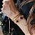 PULSEIRA COM CINCO TREVOS NEGROS BANHADO A OURO - Imagem 2