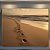 Quadro Decorativo Praia ensolarado com pegadas na areia. - Imagem 1
