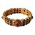 Bracelete dourado com pedras vermelhas. - Imagem 1