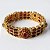 Bracelete dourado com pedras vermelhas. - Imagem 2