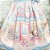 Vestido de festa infantil Petit Cherie doceria rosa e azul - Imagem 4