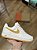 NIKE AIR FORCE 1 LOW RETRO QS “University Gold” - Imagem 1