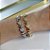 Pulseira Folheada Ouro 18k e Prata 925 Coração Cravejado - Imagem 2